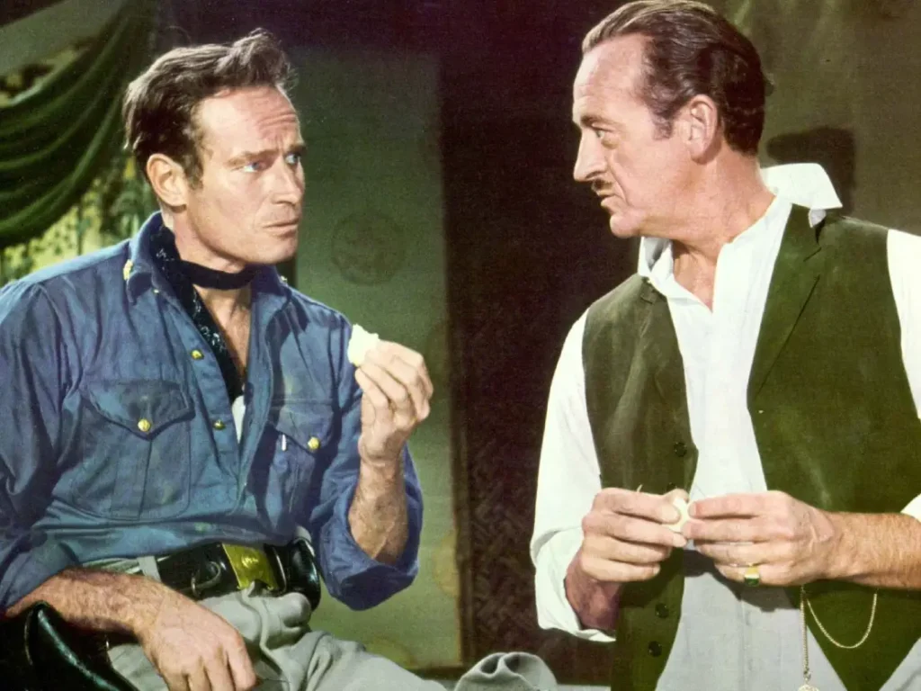 Charlton Heston y David Niven